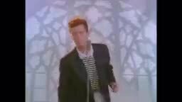 Rick Astley 的《Never Gonna Give You Up》单帧画面，两侧有宽大的黑边